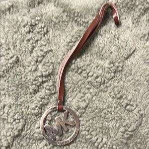 Michael Kors Silver and Brown logo charm/ hang tag